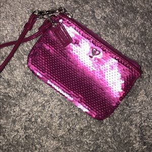 Pink sequin Coach wristlet